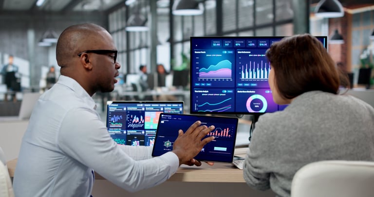 Business analyst examining KPI dashboards